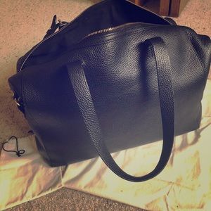 Large Cuyana leather travel bag